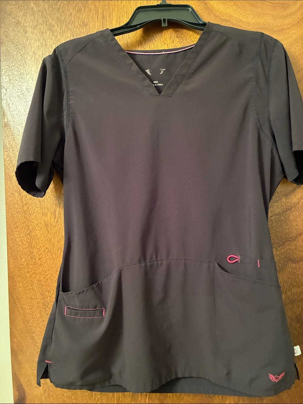 Women’s black scrub top